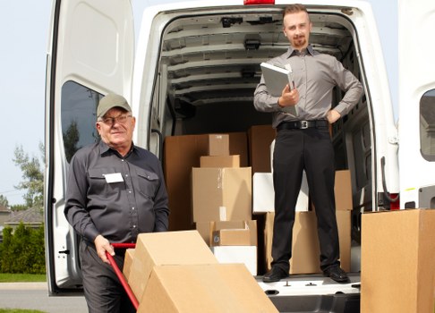 Professional movers handling household items in Bayswater