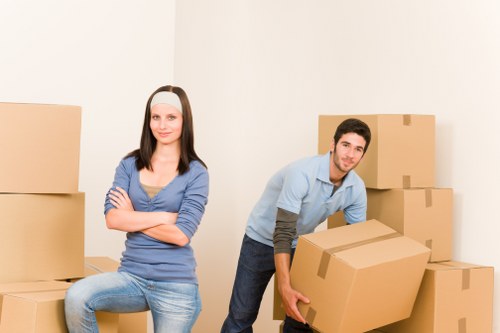 Professional removals crew following a health and safety policy