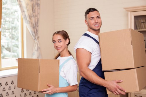 Piano movers preparing an instrument for safe relocation in Bayswater