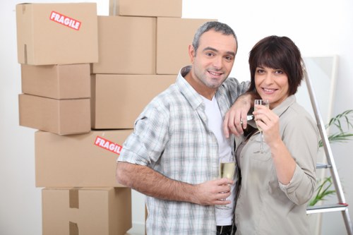 Organised packing materials and room-by-room setup after moving